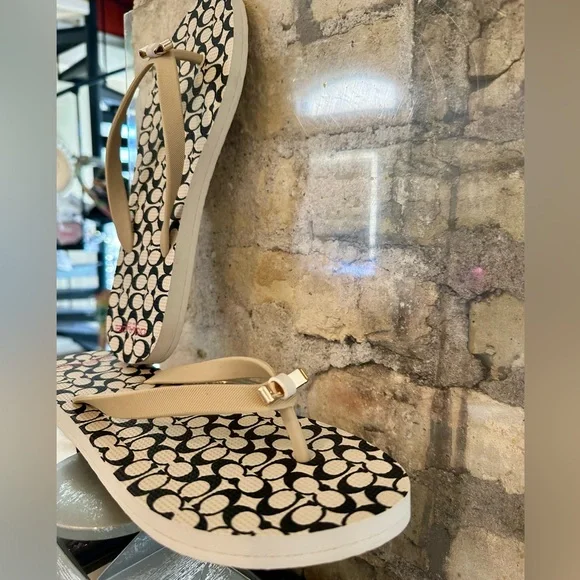 Coach Amel Signature C Thong Sandals in a black and beige colorway. - Picture 4 of 7